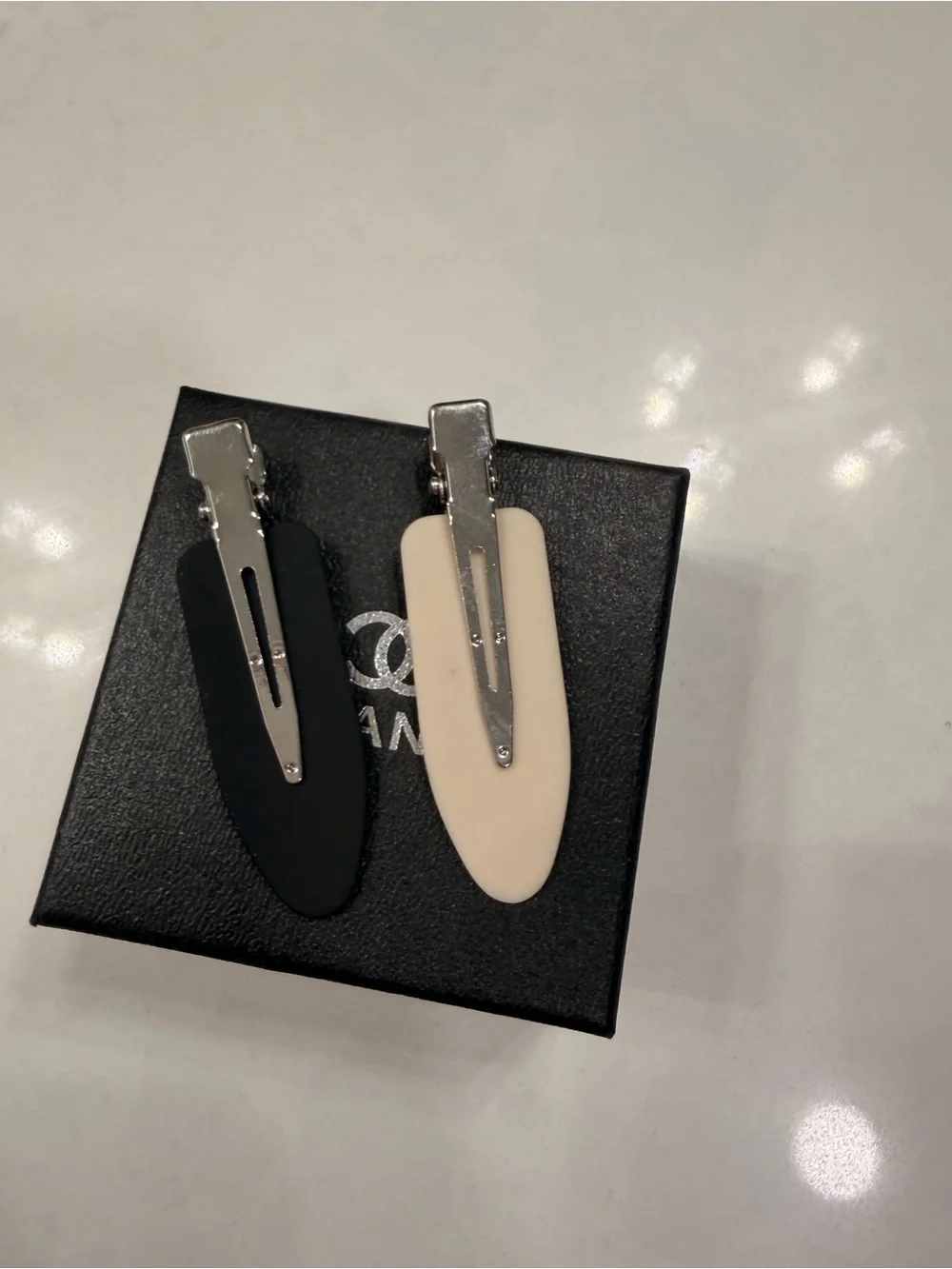CHANEL Black and Beige Logo Hair Clip Duo